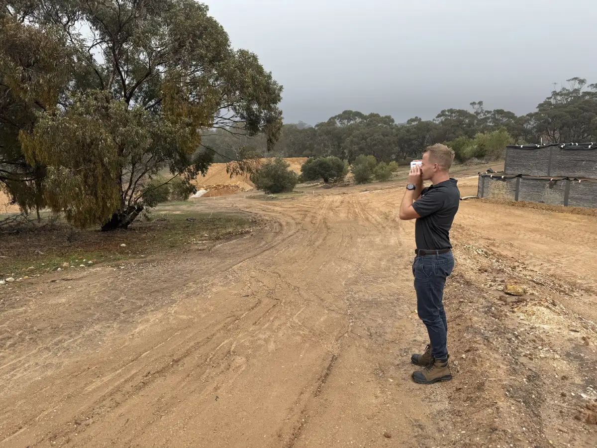 BAL Rating SA assessor measuring vegetation setbacks on a South Australian building site